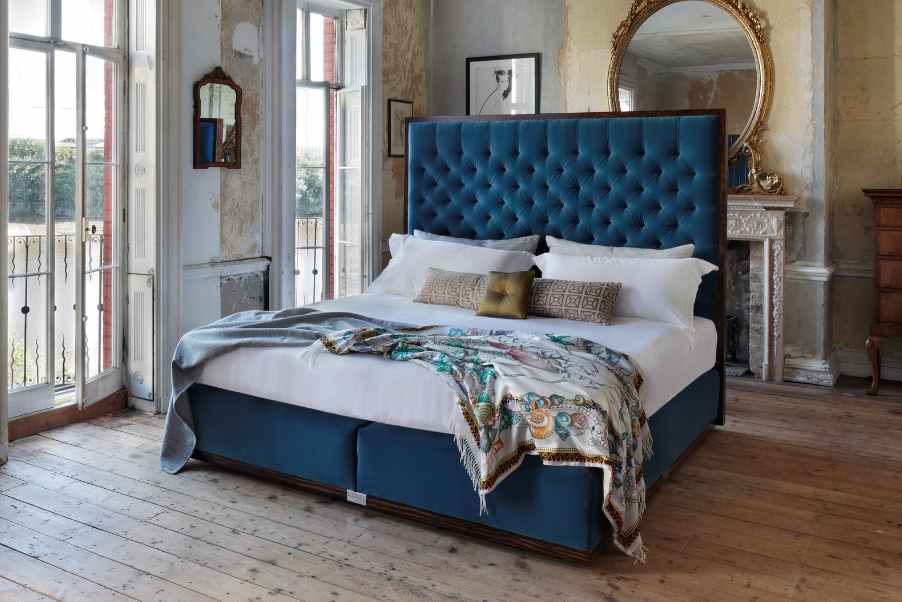 Savoir Bed State with headboard and base trim in walnut burr